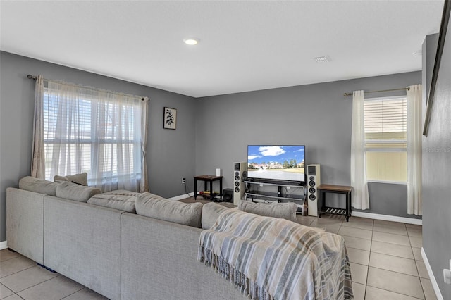 269 Ludisia Loop, Davenport, FL 33837 - living area with light tile patterned flooring and baseboards