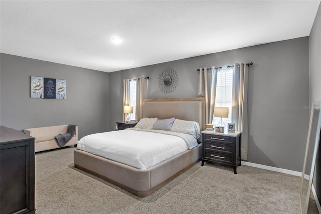 269 Ludisia Loop, Davenport, FL 33837 - bedroom featuring light colored carpet and baseboards