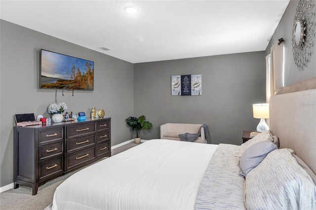 269 Ludisia Loop, Davenport, FL 33837 - bedroom featuring light colored carpet and baseboards