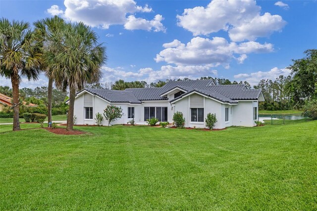 12508 Lake Denise Blvd, Clermont, FL 34711 - view of front of house with a tile roof and stucco siding