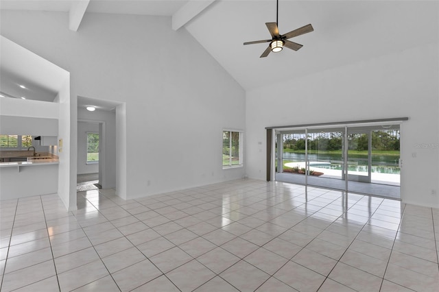 12508 Lake Denise Blvd, Clermont, FL 34711 - empty room featuring high vaulted ceiling, light tile patterned floors, beam ceiling, ceiling fan, and a sink