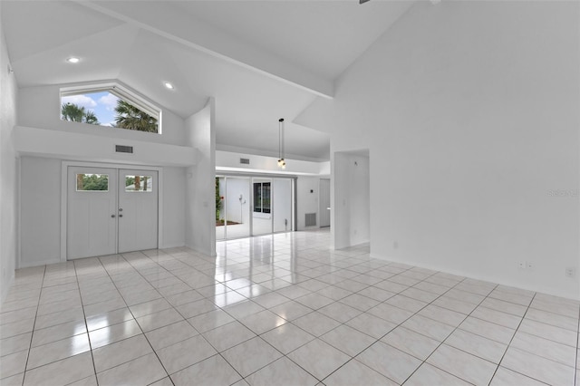 12508 Lake Denise Blvd, Clermont, FL 34711 - foyer with high vaulted ceiling and light tile patterned flooring