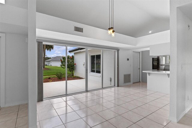 12508 Lake Denise Blvd, Clermont, FL 34711 - unfurnished living room featuring light tile patterned floors, recessed lighting, and baseboards