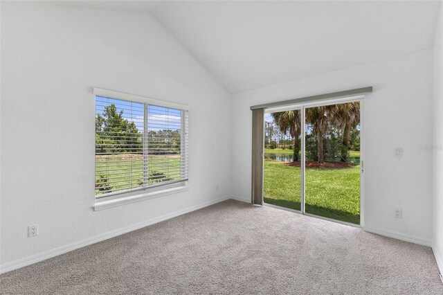 12508 Lake Denise Blvd, Clermont, FL 34711 - unfurnished room featuring vaulted ceiling, carpet, and baseboards