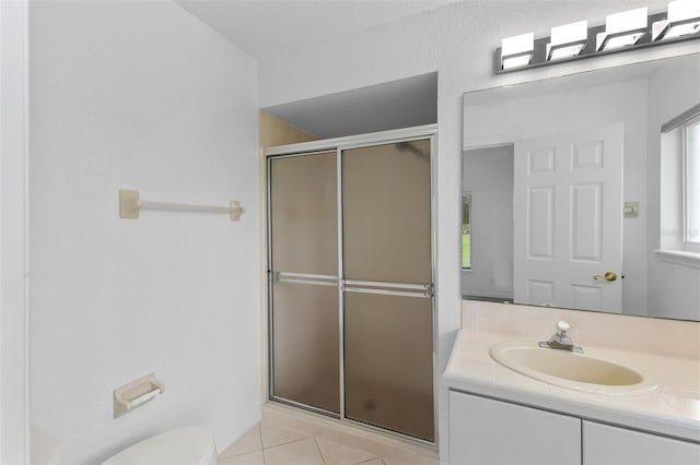 12508 Lake Denise Blvd, Clermont, FL 34711 - bathroom featuring a stall shower, vanity, toilet, and tile patterned floors