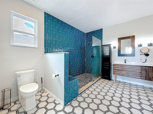 15865 Bradicks Ct, Clermont, FL 34711 - bathroom featuring walk in shower, vanity, toilet, and baseboards