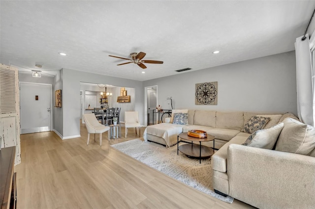 4306 Lake Underhill Rd Unit C, Orlando, FL 32803 - living area featuring a ceiling fan, light wood finished floors, recessed lighting, and baseboards