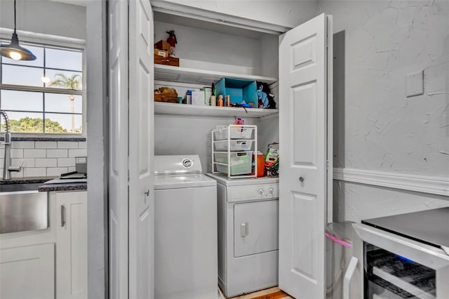 4306 Lake Underhill Rd Unit C, Orlando, FL 32803 - laundry area featuring washer and clothes dryer
