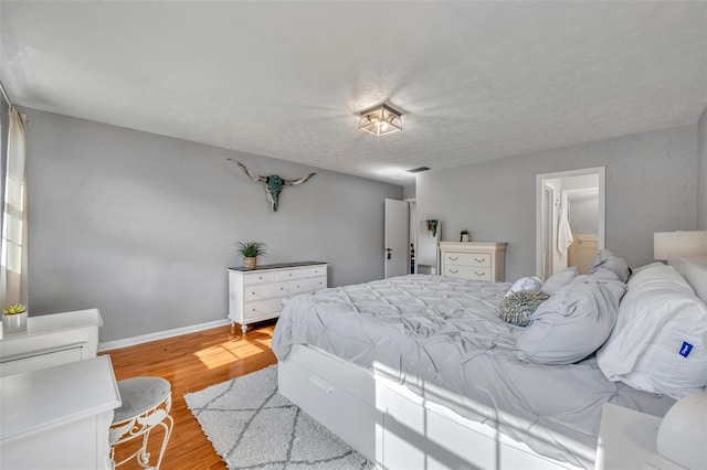 4306 Lake Underhill Rd Unit C, Orlando, FL 32803 - bedroom with light wood-style floors and baseboards
