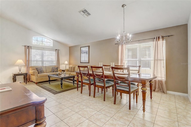 927 Orange Cosmos Blvd, Davenport, FL 33837 - dining space with light tile patterned floors, a chandelier, and lofted ceiling