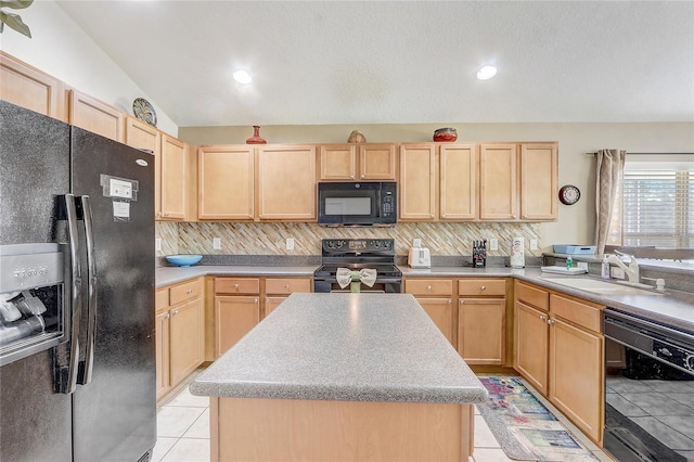 927 Orange Cosmos Blvd, Davenport, FL 33837 - kitchen with black appliances, light brown cabinetry, decorative backsplash, light tile patterned floors, and light countertops