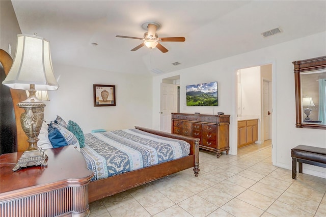 927 Orange Cosmos Blvd, Davenport, FL 33837 - bedroom featuring vaulted ceiling, light tile patterned flooring, a ceiling fan, and connected bathroom