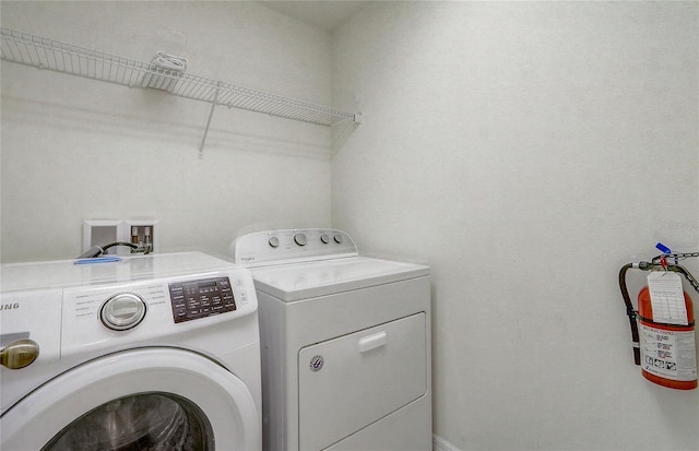 927 Orange Cosmos Blvd, Davenport, FL 33837 - laundry room with independent washer and dryer