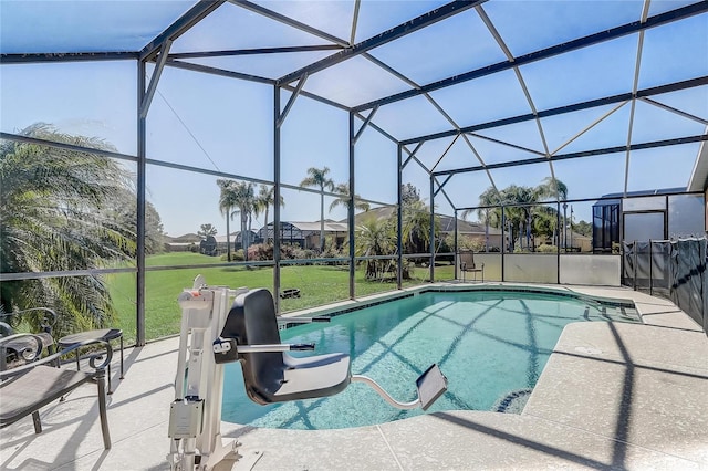 927 Orange Cosmos Blvd, Davenport, FL 33837 - outdoor pool featuring a lawn, glass enclosure, and a patio area