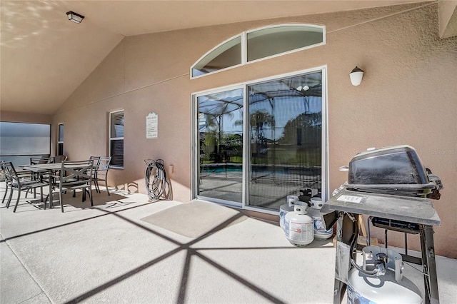 927 Orange Cosmos Blvd, Davenport, FL 33837 - view of patio / terrace featuring a grill and outdoor dining area