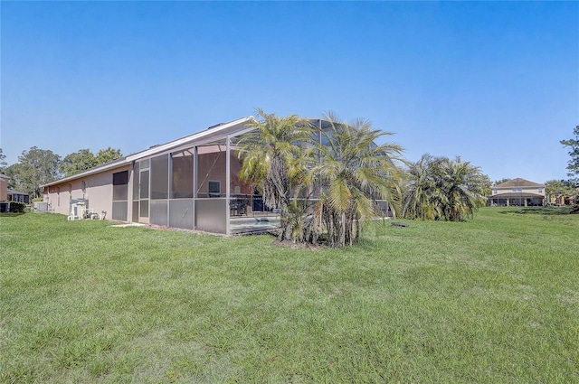 927 Orange Cosmos Blvd, Davenport, FL 33837 - view of green lawn featuring an outdoor pool and glass enclosure