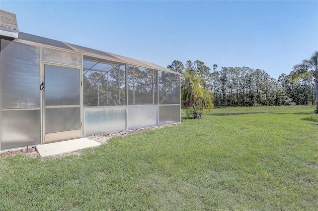 927 Orange Cosmos Blvd, Davenport, FL 33837 - view of grassy yard with a lanai