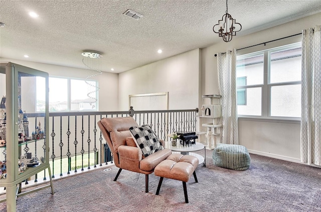 1147 Wildmeadow Run, Winter Park, FL 32792 - sitting room featuring carpet, recessed lighting, a textured ceiling, a chandelier, and baseboards