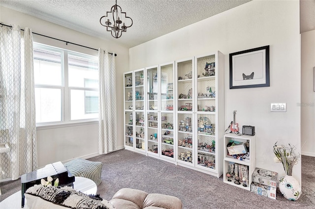 1147 Wildmeadow Run, Winter Park, FL 32792 - sitting room featuring carpet flooring, healthy amount of natural light, a textured ceiling, and a chandelier