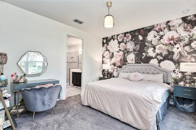 1147 Wildmeadow Run, Winter Park, FL 32792 - carpeted bedroom featuring connected bathroom and a textured ceiling
