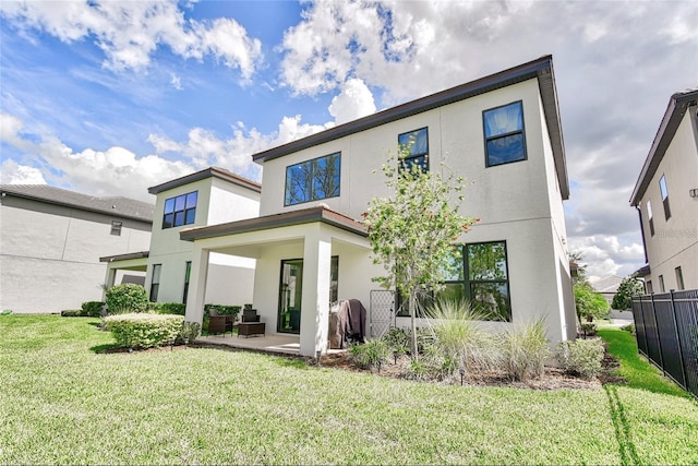 1147 Wildmeadow Run, Winter Park, FL 32792 - rear view of house featuring stucco siding and a patio area
