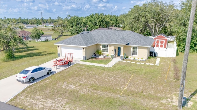 15303 SW 52nd Cir, Ocala, FL 34473 - view of front of house with a garage, concrete driveway, roof with shingles, and stucco siding