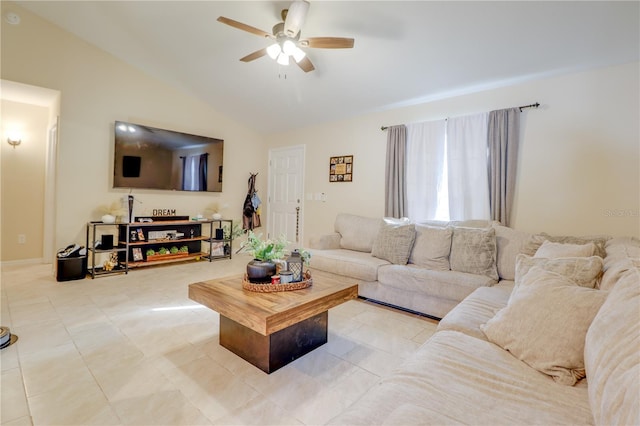 15303 SW 52nd Cir, Ocala, FL 34473 - living area with a ceiling fan, vaulted ceiling, and light tile patterned floors