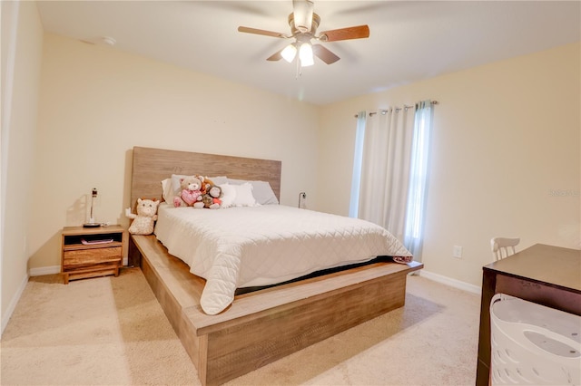 15303 SW 52nd Cir, Ocala, FL 34473 - bedroom with light colored carpet, baseboards, and ceiling fan