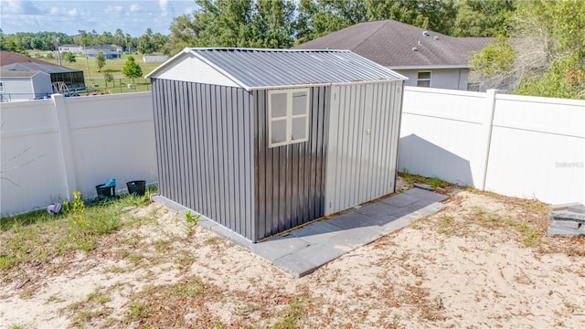 15303 SW 52nd Cir, Ocala, FL 34473 - view of shed with a fenced backyard