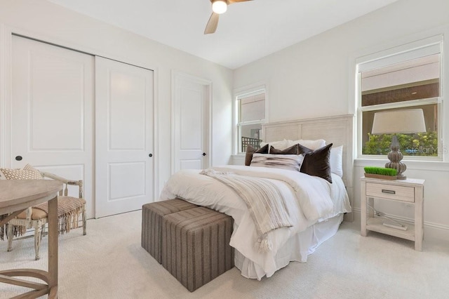 13791 Abberwick Dr, Orlando, FL 32832 - bedroom with light colored carpet, a closet, and ceiling fan