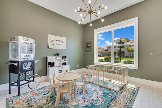 13791 Abberwick Dr, Orlando, FL 32832 - rec room with a chandelier and baseboards