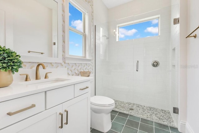 13791 Abberwick Dr, Orlando, FL 32832 - bathroom with a shower stall, healthy amount of natural light, vanity, and toilet