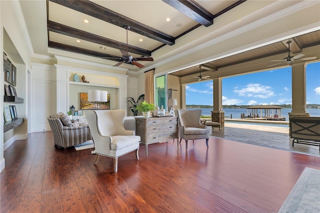 10845 Bayshore Dr, Windermere, FL 34786 - sitting room with a ceiling fan, healthy amount of natural light, ornate columns, beamed ceiling, and ornamental molding
