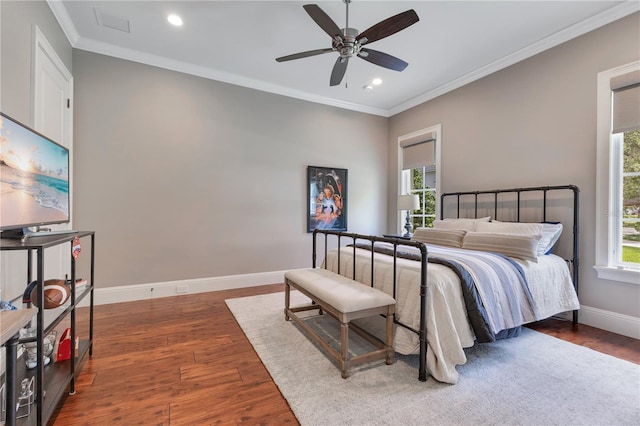 10845 Bayshore Dr, Windermere, FL 34786 - bedroom with multiple windows, recessed lighting, baseboards, wood finished floors, and ornamental molding