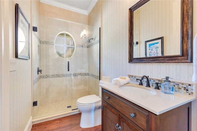 10845 Bayshore Dr, Windermere, FL 34786 - bathroom featuring ornamental molding, vanity, a stall shower, toilet, and wood finished floors