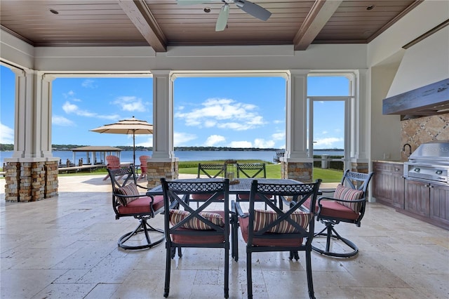 10845 Bayshore Dr, Windermere, FL 34786 - view of patio with outdoor dining area, ceiling fan, and a water view