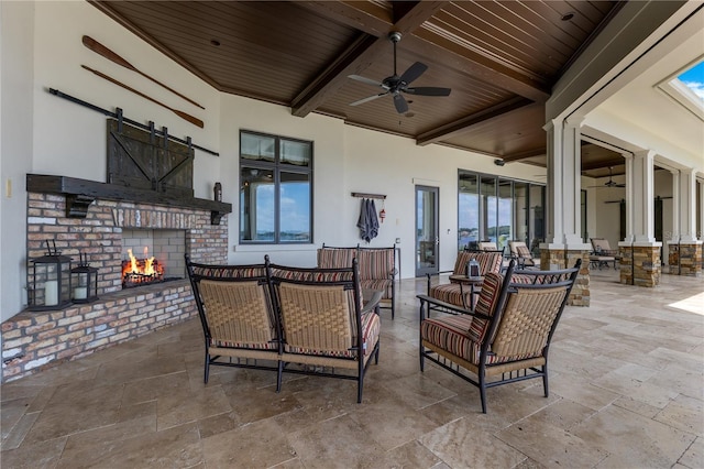 10845 Bayshore Dr, Windermere, FL 34786 - view of patio with ceiling fan and an outdoor living space with a fireplace
