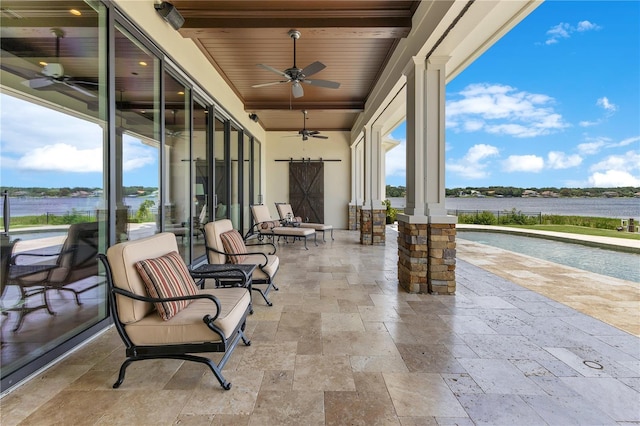 10845 Bayshore Dr, Windermere, FL 34786 - view of patio with a ceiling fan, an outdoor pool, and a water view