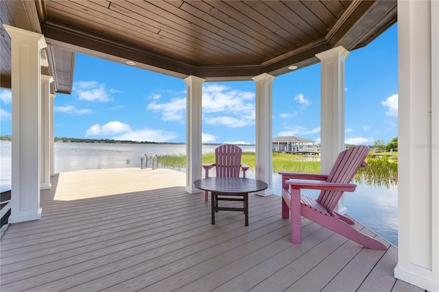 10845 Bayshore Dr, Windermere, FL 34786 - wooden deck with a water view