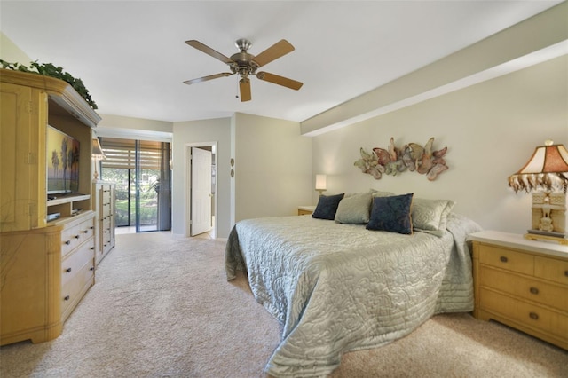 1074 Kensington Park Ct Unit 101, Altamonte Springs, FL 32714 - bedroom with light carpet, access to exterior, and ceiling fan