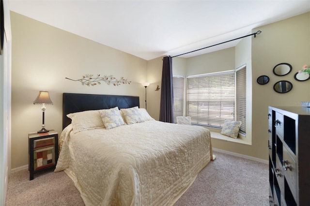 1074 Kensington Park Ct Unit 101, Altamonte Springs, FL 32714 - carpeted bedroom featuring baseboards