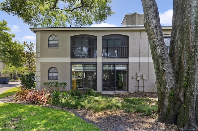 1074 Kensington Park Ct Unit 101, Altamonte Springs, FL 32714 - back of house with stucco siding