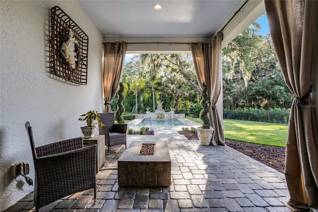 190 Osprey Hammock Trl, Sanford, FL 32771 - view of patio with an outdoor fire pit and view of wooded area