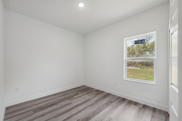 16904 SW 30th Avenue Rd, Ocala, FL 34473 - unfurnished room with wood finished floors, baseboards, and recessed lighting