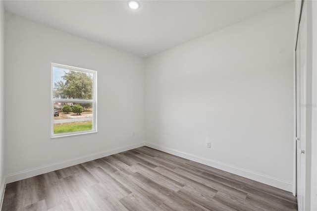 16904 SW 30th Avenue Rd, Ocala, FL 34473 - empty room featuring wood finished floors, baseboards, and recessed lighting