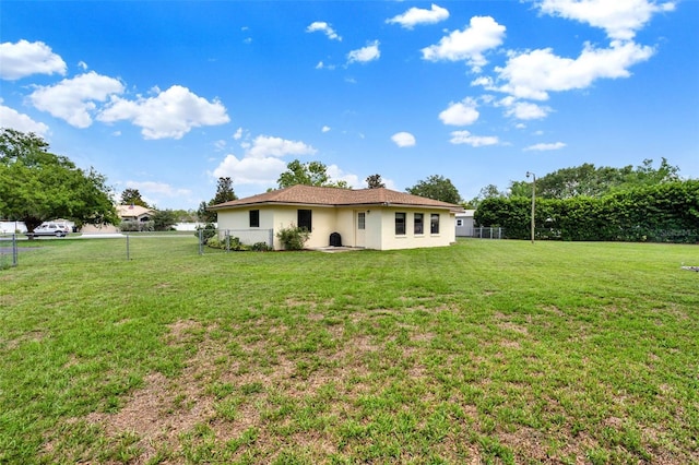 409 Jumper Dr S, Bushnell, FL 33513 - back of property featuring stucco siding