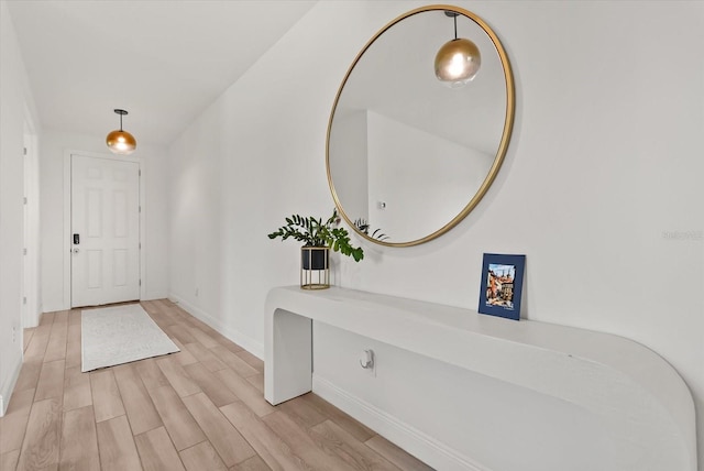 5700 Iron Brand Rd, Saint Cloud, FL 34771 - foyer featuring light wood-type flooring and baseboards