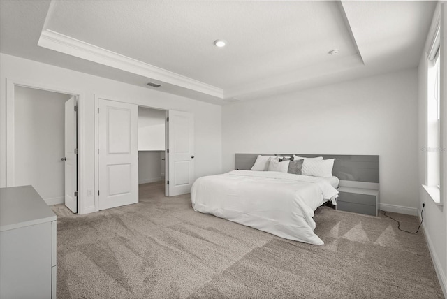 5700 Iron Brand Rd, Saint Cloud, FL 34771 - carpeted bedroom with a raised ceiling, baseboards, and crown molding