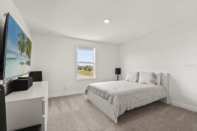 5700 Iron Brand Rd, Saint Cloud, FL 34771 - bedroom featuring light colored carpet and baseboards