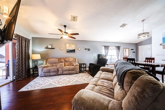 156 Carrera Ave, Davenport, FL 33897 - living room featuring wood finished floors, ceiling fan, and a textured ceiling
